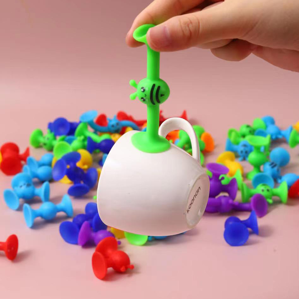 Bienen-Saugnapf-Spielzeug, wei – Limbo Game Set Bewertung und Preis